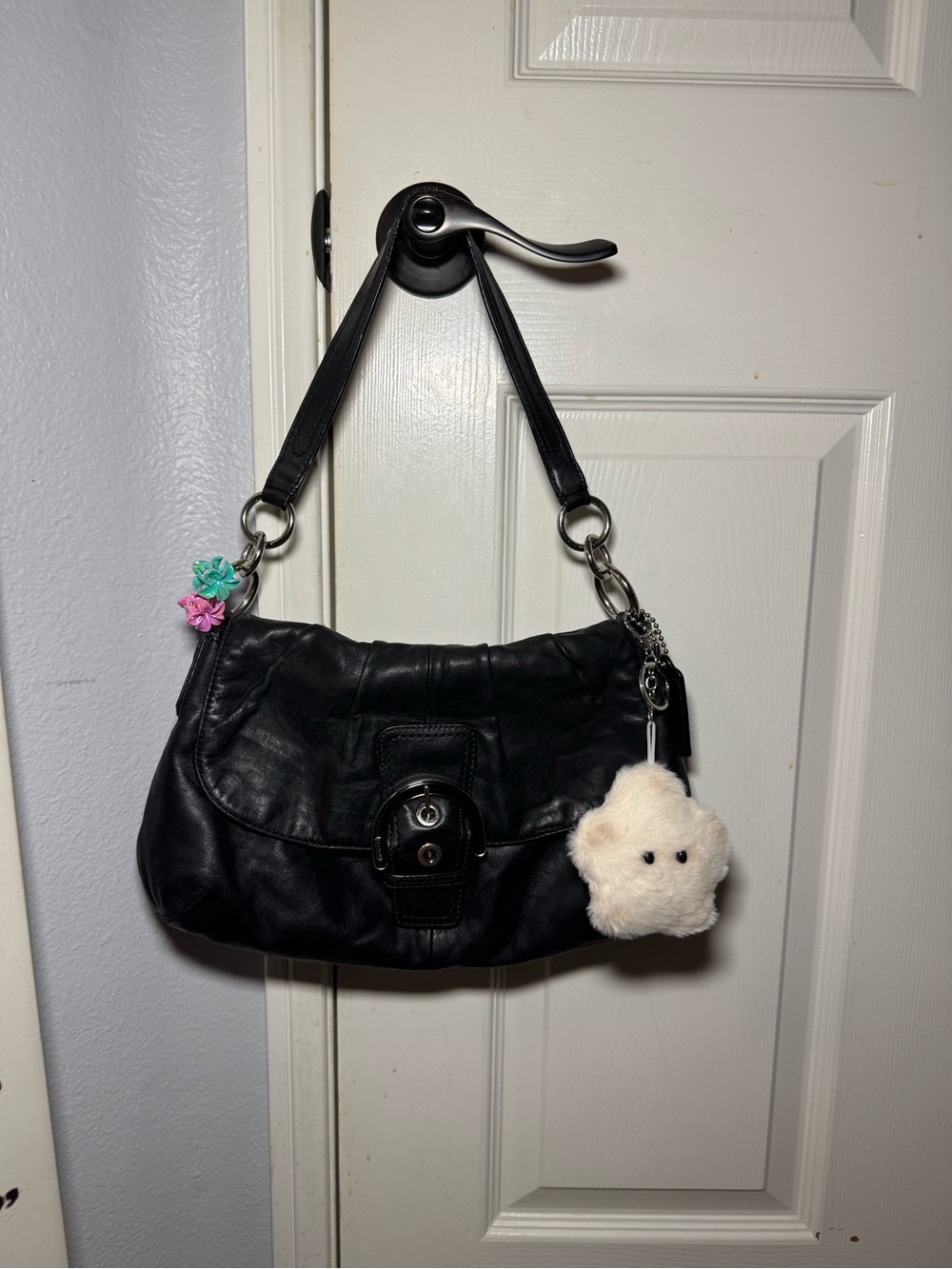 Coach Black Leather Hobo with Plush Charm and Floral Accents on Strap